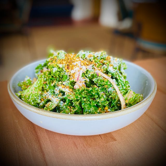 Large Bowl of Kale and Pistachio Salad.