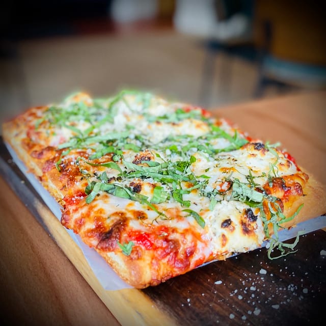 Tray of Formaggi Pizza.